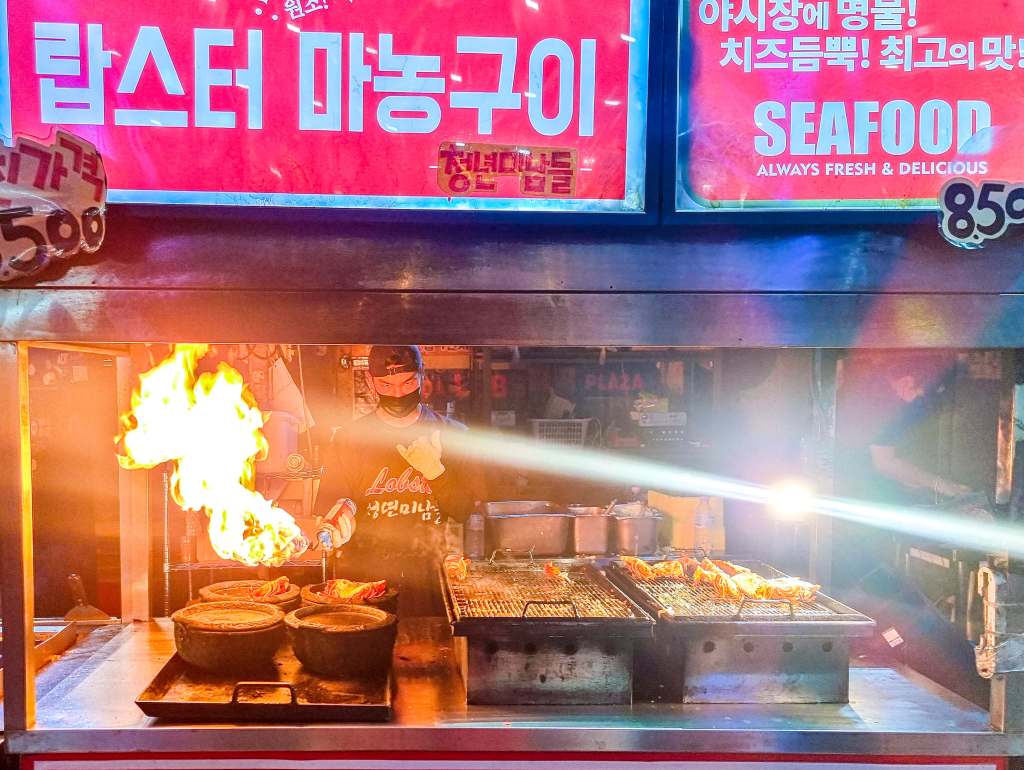 street food with open flame at jeju night market