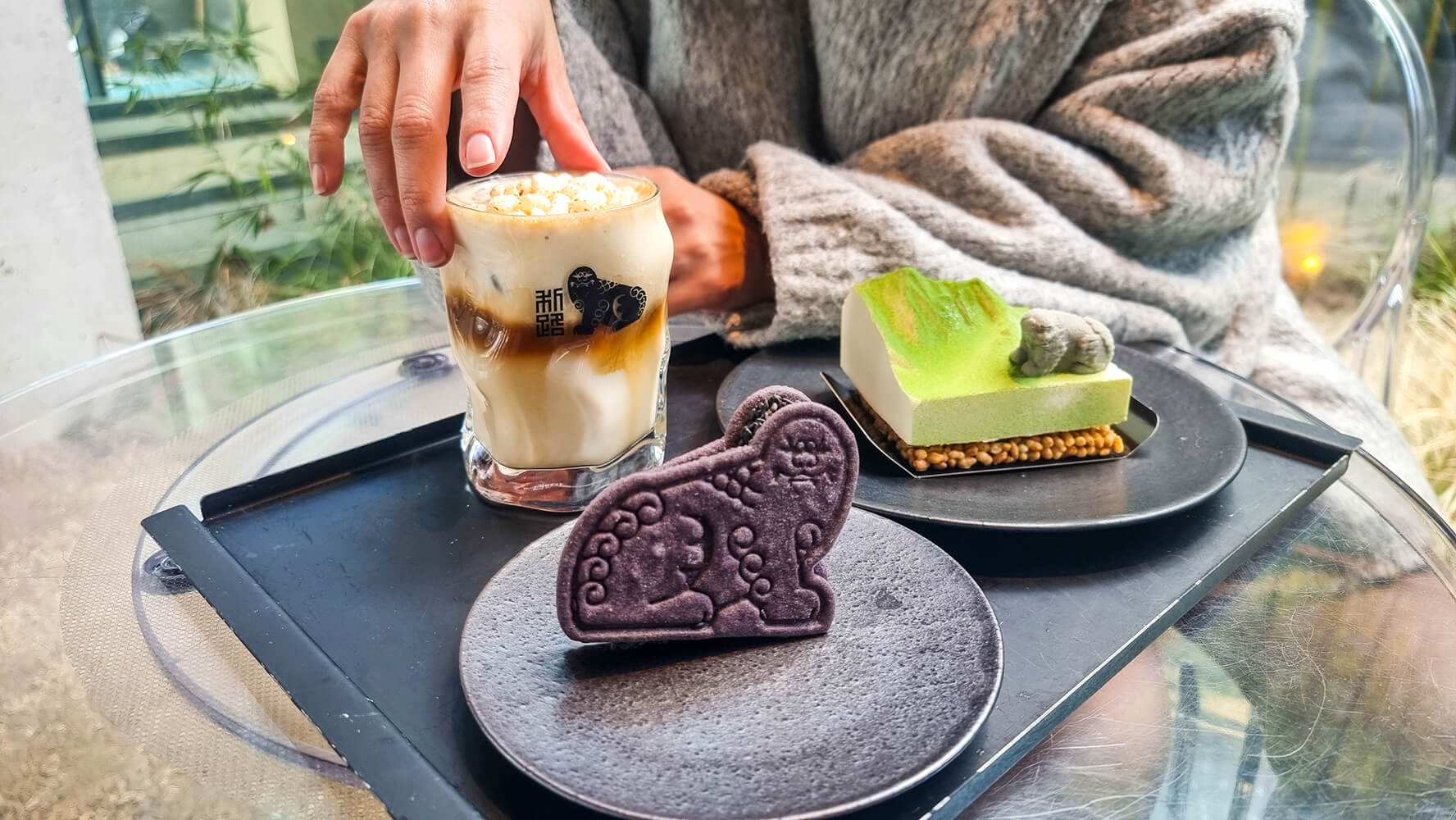 coffee and snacks shaped like creatures from korean mythology