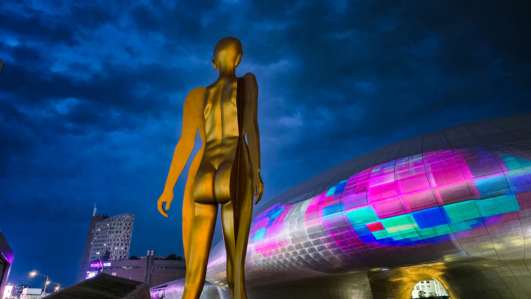 large sculpture in front of the Dongdaemun Design Plaza